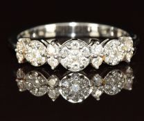 A platinum ring set with diamonds, 5.3g, size U