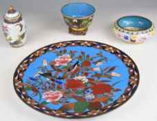 Cloisonné charger, dishes and covered jar, largest diameter 31cm
