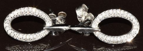 A pair of 18ct white gold oval drop earrings set with diamonds, 3.3g, 2cm