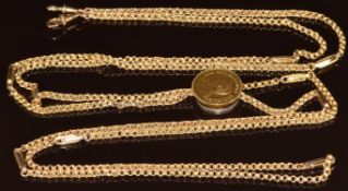 A 9ct gold guard chain made up of circular and elongated links, with slider made from a South