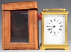 French gilt metal cased carriage clock with bevelled glass panels and white enamel dial, maximum