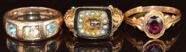 French 18ct gold ring set with a garnet (band broken, 1.3g), Victorian mourning ring set with enamel