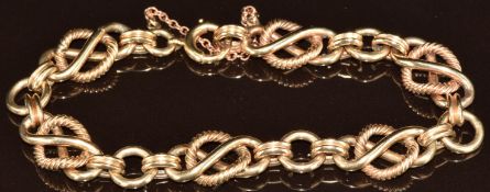 A 9ct gold bracelet made up of fancy links, 27.8g, 19.5cm