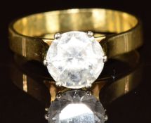 An 18ct gold ring set with a round cut quartz, 4.4g, size P