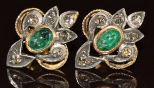 A pair of c1900 gold and silver earrings each set with an emerald cabochon and rose cut diamonds,