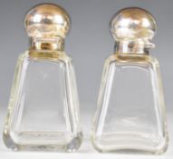 Pair of Edward VII hallmarked silver topped dressing table or similar bottles of square tapering