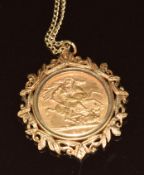 A 1975 gold full sovereign in 9ct gold mount on 9ct gold chain