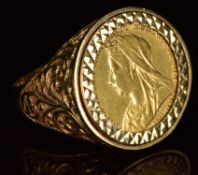 A 9ct gold ring set with a 1900 gold full sovereign, 10.6g, size W