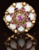 A 14k gold ring set with rubies and opals in a tiered cluster setting, 5.2g, size O