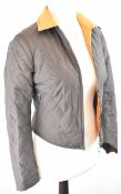 Hermès reversible quilted zip-up jacket in orange and brown, with signature hardware, XXS