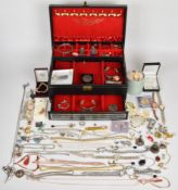 A collection of jewellery including Radley and  Anne Klein watches, two silver charms, twelve silver