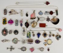 Thirty eight silver pendants including mother of pearl, glass, garnet, amethyst, labradorite, etc (