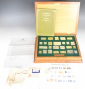 Cased set of 25 hallmarked silver Stamps of Royalty ingots or stamps, total weight approximately