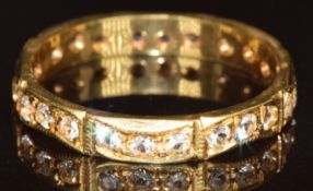 An 18ct gold eternity ring set with quartz, 2.8g, size P