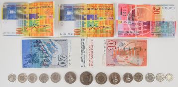Modern redeemable Swiss coins and banknotes comprising 70 francs of notes and approximately 15