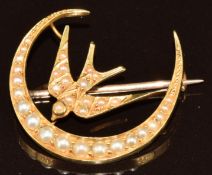 Edwardian 9ct gold brooch set with split pearls in the form of a crescent and swallow, 4.2g, 2.5cm