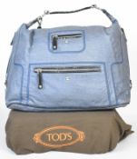 Four Tod's handbags, some in dust bags