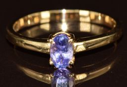 An 18k gold ring set with an oval cut tanzanite of approximately 0.5ct, 3g, size P/Q