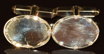 A pair of 9ct gold cufflinks set with diamonds, 6.4g