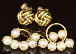 A pair of 9ct gold earrings each set with six cultured pearls (4.5g) and a pair of gold plated