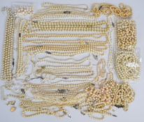 A collection of cultured pearls and faux pearls including faux pearl necklace with 9ct gold clasp,