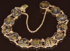 A 14k gold Japanese bracelet made up of twelve Damascene panels dated 1929, 15g, 18cm