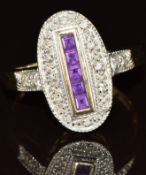 A 9ct gold ring set with calibre cut amethysts and diamonds, 3.6g, size N