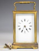 19th or early 20th century gilt cased carriage clock with bevelled glass panels, the single train