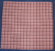 Welsh wool blanket with geometric design on a red ground, 157cm x 150cm