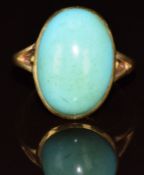 A c1900 18ct gold ring set with a turquoise cabochon, 4.1g, size I