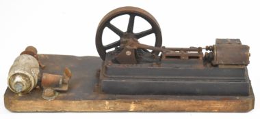 Stuart S50 live steam single cylinder engine, length 22cm, on wooden base with bicycle or similar