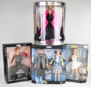 Four Mattel Barbie Collector's Edition dolls comprising Christmas, 40th Anniversary, Marilyn