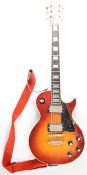 CMI Les Paul style electric guitar in cherry sunburst finish with rosewood fretboard, pearlescent