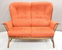 Ercol Evergreen elm furniture suite with red upholstery comprising two-seat sofa, two arm chairs,