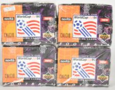 Four sealed Upper Deck World Cup USA '94 football trading card boxes, each box containing 50 packs