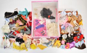 A collection of vintage Pedigree Sindy clothing and accessories, mostly dating to the 1970's and a