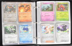 Two hundred and twenty Pokémon cards from Obsidian Flames, Paldean Fates, Journey Together,