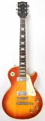 Gibson Les Paul Deluxe electric guitar in sunburst finish with rosewood fretboard, mother of pearl