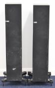 KEF Q-Series Q500 floorstanding speakers with adjustable floor spikes and covers, height including