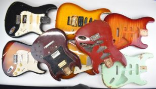 Eight vintage guitar bodies to include Fender and Gibson style examples, some appear to be