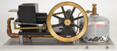 Scott vacuum or flame gulper engine, with cam operated gear and water hopper cooling, driving a 13cm