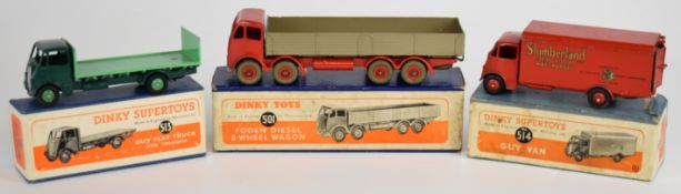 Three Dinky Toys diecast model trucks and vans comprising Foden Diesel 8-Wheel wagon 501, Guy Flat
