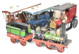 Four tinplate and similar models comprising two showman's steam traction engines, Adler steam