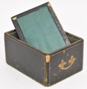 Jaques & Son 'The Staunton Chessmen' casket style green leather chess piece box with tooled gold