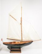 Aurelia model classic sailing yacht with fibreglass hull, planked wooden deck, brass fittings and