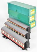 Three Bassett Lowke 0 gauge model railway BR 3rd class corridor coaches, Kings Cross-Edinburgh, in