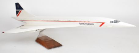 Fibreglass or similar British Airways Concorde painted model aeroplane, G-BOAC, on metal and