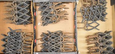 Sixty two possibly Victorian cast iron lattice work lawn or border edging panels, each 22cm long,