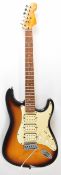 Fender Stratocaster style electric guitar in tobacco sunburst finish with maple neck, pearlescent