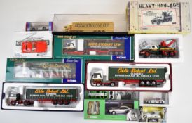 Eleven Corgi and similar diecast model heavy goods vehicles and sports cars, all in original boxes.
